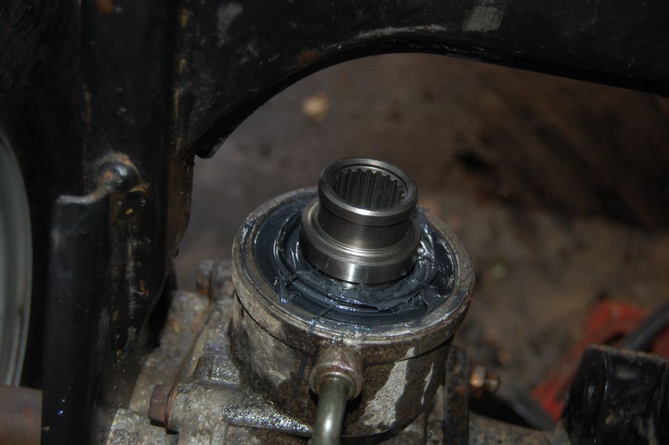 close-up of splined shaft and bearing assembly with grease