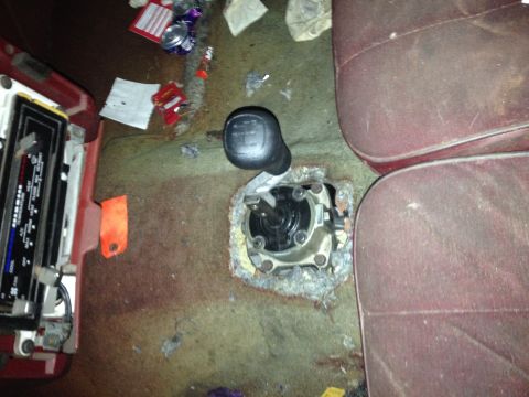1981 Ford LTD - Hole cut in the trans tunnel. It got cut out a little more after this and I need to find a shifter boot but it comes out in a good place. S…