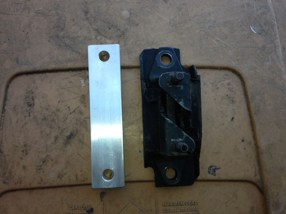 I put a level line on the engine before taking out the AOD shell I had bolted to the trans. The TKO uses the same bolt pattern for the mount as the AOD but the mounting pad is about 5/8" higher. I made a spacer out of 5/8" aluminum. It's just a cut and two holes but I like it.