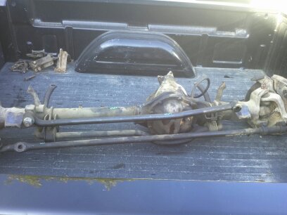 1995 Ford Bronco - This is a front axle assembly, likely removed from a vehicle for repair or replacement.