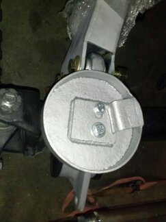 1995 Ford Bronco - Close-up of a metal suspension part with a SuperMotors logo visible at the bottom.