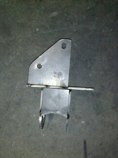 1995 Ford Bronco - A metal bracket is shown against a gray background, with Supermotors.net branding at the bottom.