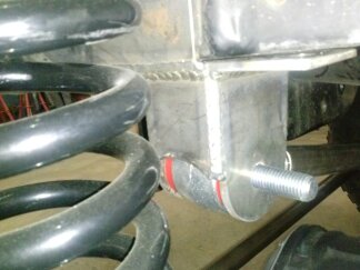 1995 Ford Bronco - Detail of a vehicle's suspension system, likely a modification part. Supermotors.net logo present.