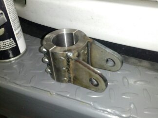 1995 Ford Bronco - Custom metal bracket with bolts, likely for automotive modification.