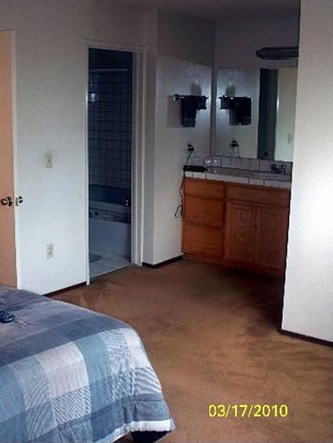 1989 Ford Bronco - A bedroom and adjoining bathroom are shown, with a date stamp of 03/17/2010 in the corner.