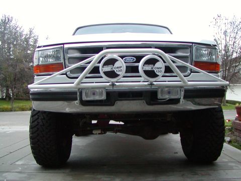 1995 Ford Bronco - This 1995 Ford Bronco features a custom front bumper with integrated lights and a bull bar.