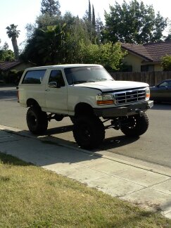 1995 Ford Bronco - This lifted 1992 Ford Bronco is equipped with large off-road tires and aftermarket bumper.