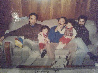 1995 Ford Bronco - A family gathers on a couch for a holiday photo.