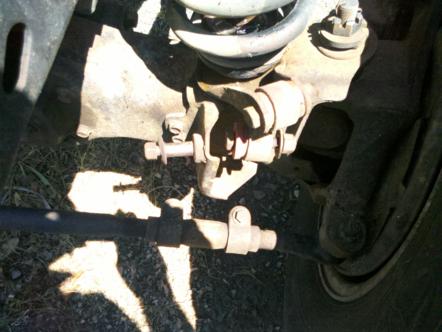 1982 Ford Bronco - Close-up view of vehicle suspension and steering parts, with a SuperMotors watermark.
