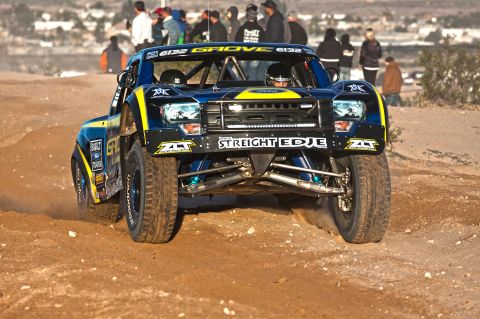 1996 Ford Bronco - This off-road race truck, number 6132, is seen competing on a dirt track.
