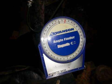 1996 Ford Bronco - A Swanson angle finder tool is used to measure an angle, likely on a vehicle part.
