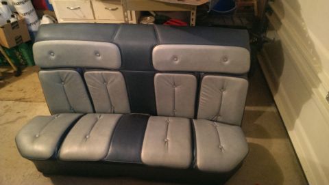 1975 Ford Ranchero - This is a two-tone interior car seat with button tufting, likely a bench seat from a classic vehicle.