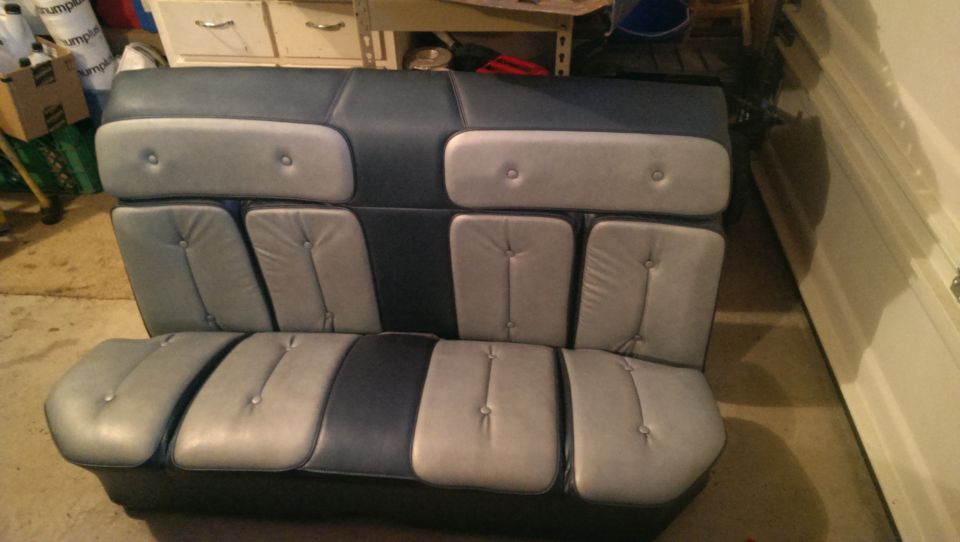 Two-tone interior car seat with button tufting