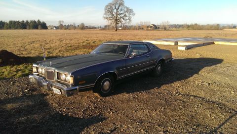1975 Ford Ranchero - 1974 Ford Elite coupe with a distinctive grille and quad headlights.
