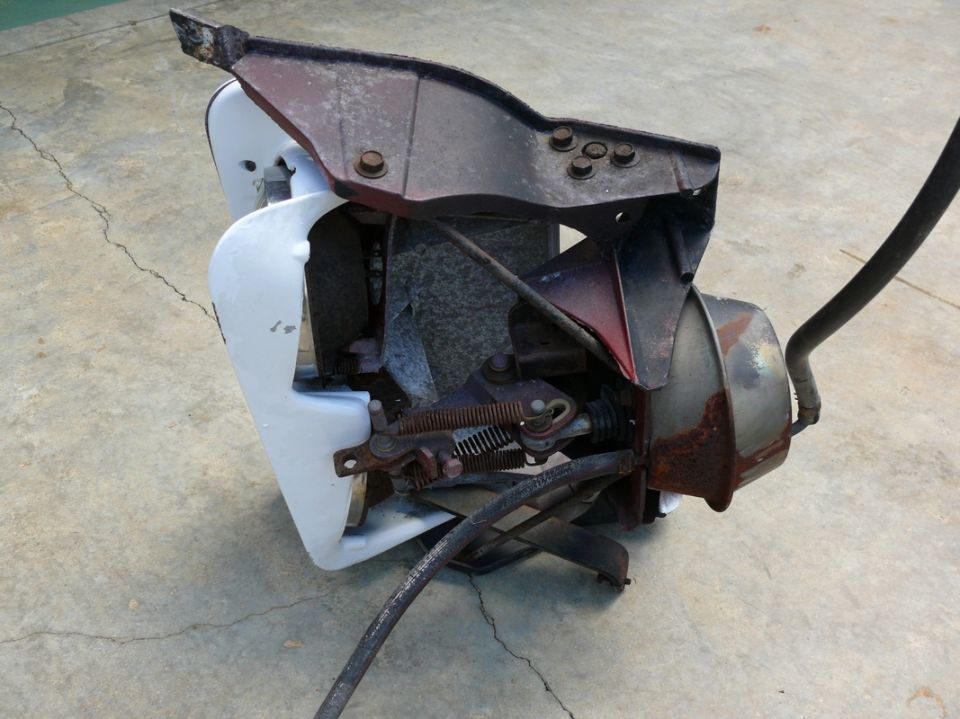 Brake booster assembly with metal bracket and hoses