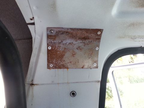 1992 Ford Bronco - about to open the drivers side..this one had rivets in it and one screw...can't wait to how the inside looks.