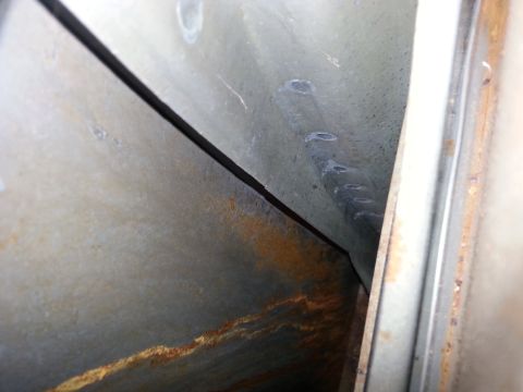 1992 Ford Bronco - picture down inside the b-pillar you can see the rust stain running towards the floor.