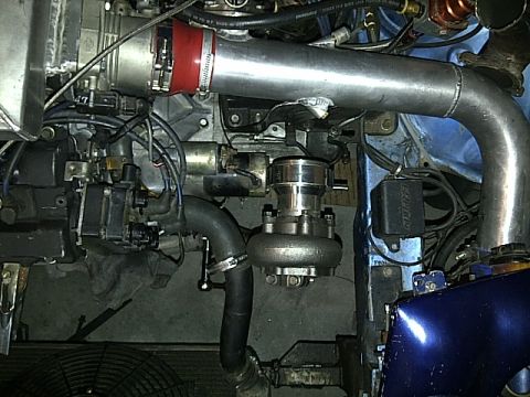 1995 Ford Probe - Custom engine modifications are visible, including a turbocharger and large diameter piping.