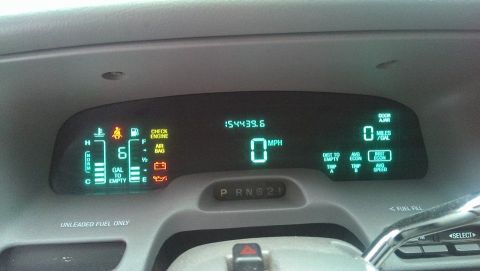 2000 Mercury Grand Marquis - Dashboard of a 2000 Mercury Grand Marquis showing 0 mph and 154439.6 miles on the odometer.