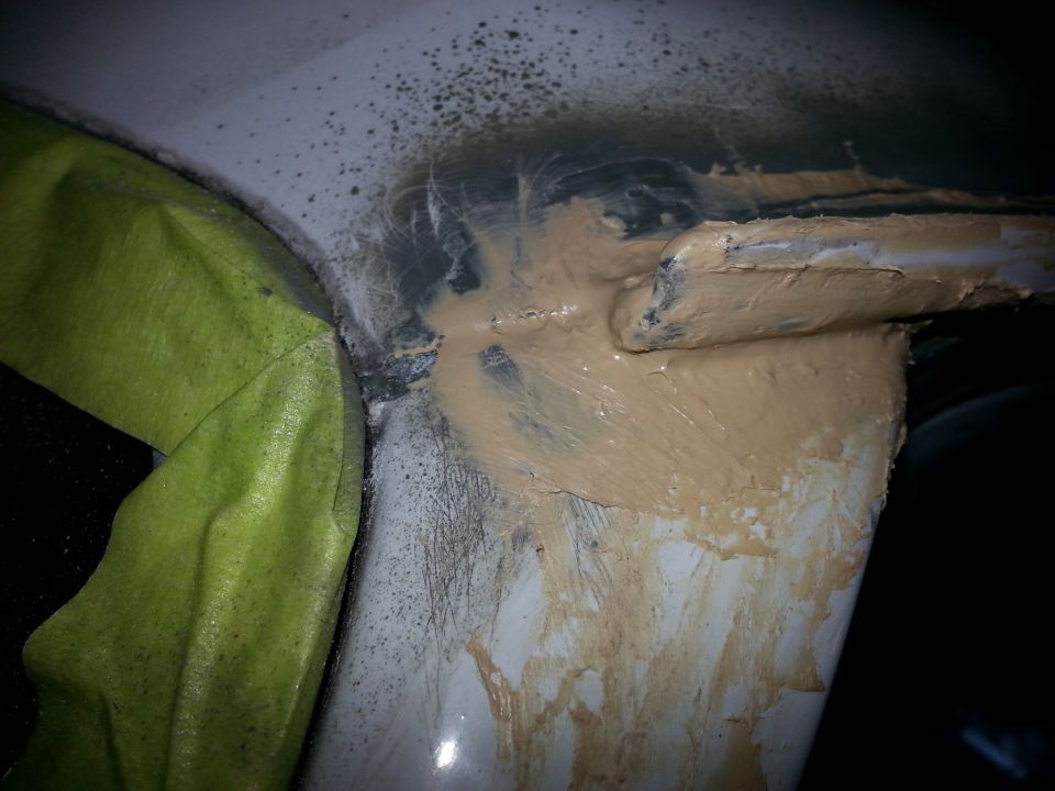Body filler applied to drip rail of a 1992 Ford Bronco