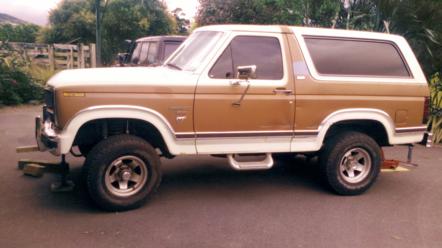 1982 Ford Bronco - This 1982 Ford Bronco is shown in a side profile, a two-tone brown and white paint scheme.