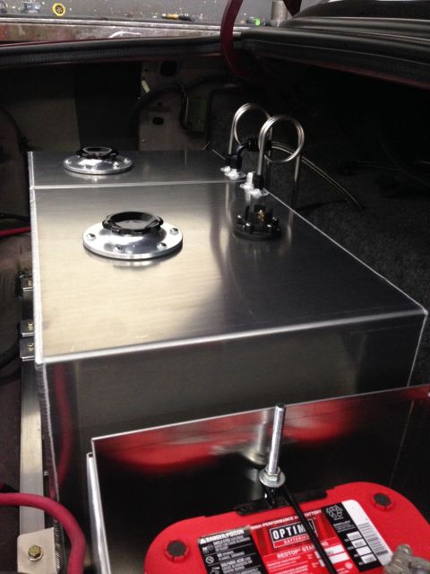 1992 Ford Crown Victoria - Aftermarket fuel cell and battery installed in the trunk of a car.