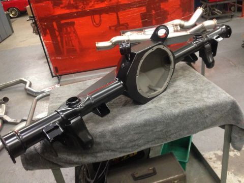 1992 Ford Crown Victoria - A freshly painted rear axle assembly sits on a table, ready for installation.