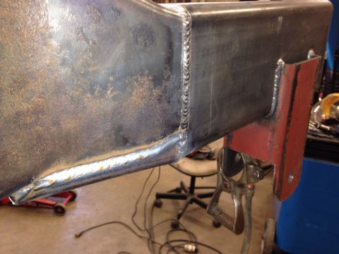 1993 Ford Bronco - Close-up of a welded metal part, showing extensive weld work and surface imperfections.