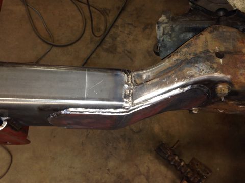 1993 Ford Bronco - Close-up of a modified vehicle frame, showing recent welding work on the chassis.