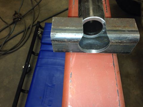1993 Ford Bronco - Metal pipe joint with a circular opening, likely a custom fabrication part.
