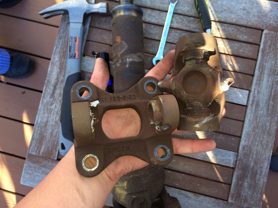 Driveshaft yoke and flange with "SPICER" and "C2-2-661-13" visible