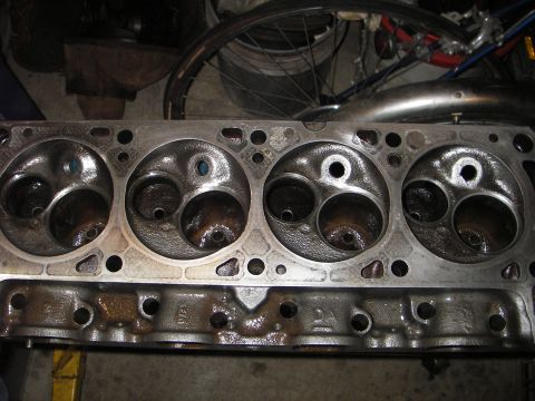 1972 Ford Ranchero - Close-up of an engine cylinder head, revealing its internal structure and condition.