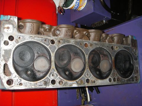 1972 Ford Ranchero - A V8 engine cylinder head, likely from a Ford, is shown with its valves and combustion chambers.