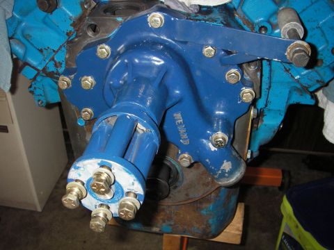 1972 Ford Ranchero - Close-up of a blue Weiand water pump assembly mounted on an engine block.