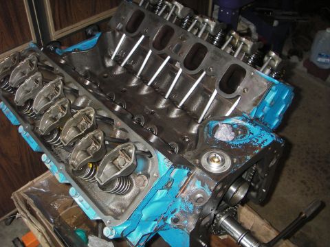 1972 Ford Ranchero - Close-up of a V8 engine block, showing internal components and blue paint.