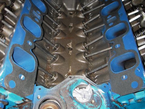 1972 Ford Ranchero - Close-up view of an engine block with intake manifold gaskets and pushrods installed.