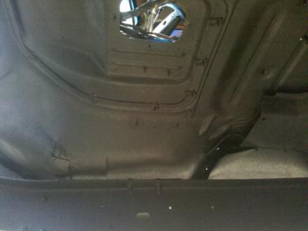 1982 Ford Bronco - Underside view of a vehicle's frame and floor pan, with a watermark at the bottom right.