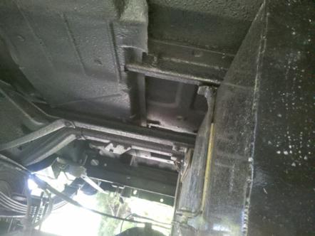 1982 Ford Bronco - The underside of a vehicle is visible, with a watermark indicating the source as SUPERMOTORS.NET.