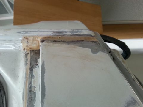 1992 Ford Bronco - This photo shows body work being done on a vehicle's drip rail, with visible filler and primer.