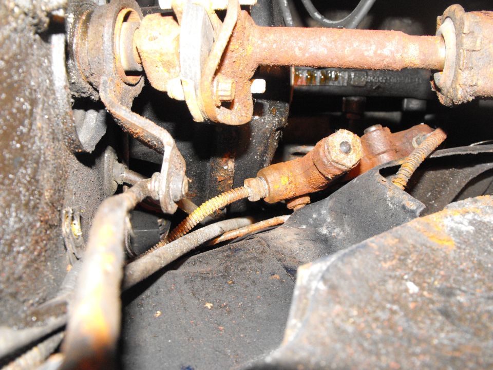 That large fitting screwed into the proportioning valve is what stops most DIY types from replacing the lines themselves, because it's different than what comes on the pre-made polymer coated lines you get at the parts stores.