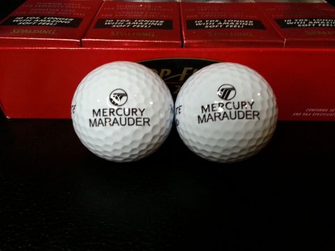 2003 Mercury Marauder - These golf balls are branded with 'Mercury Marauder' and are displayed with Spalding boxes in the background.