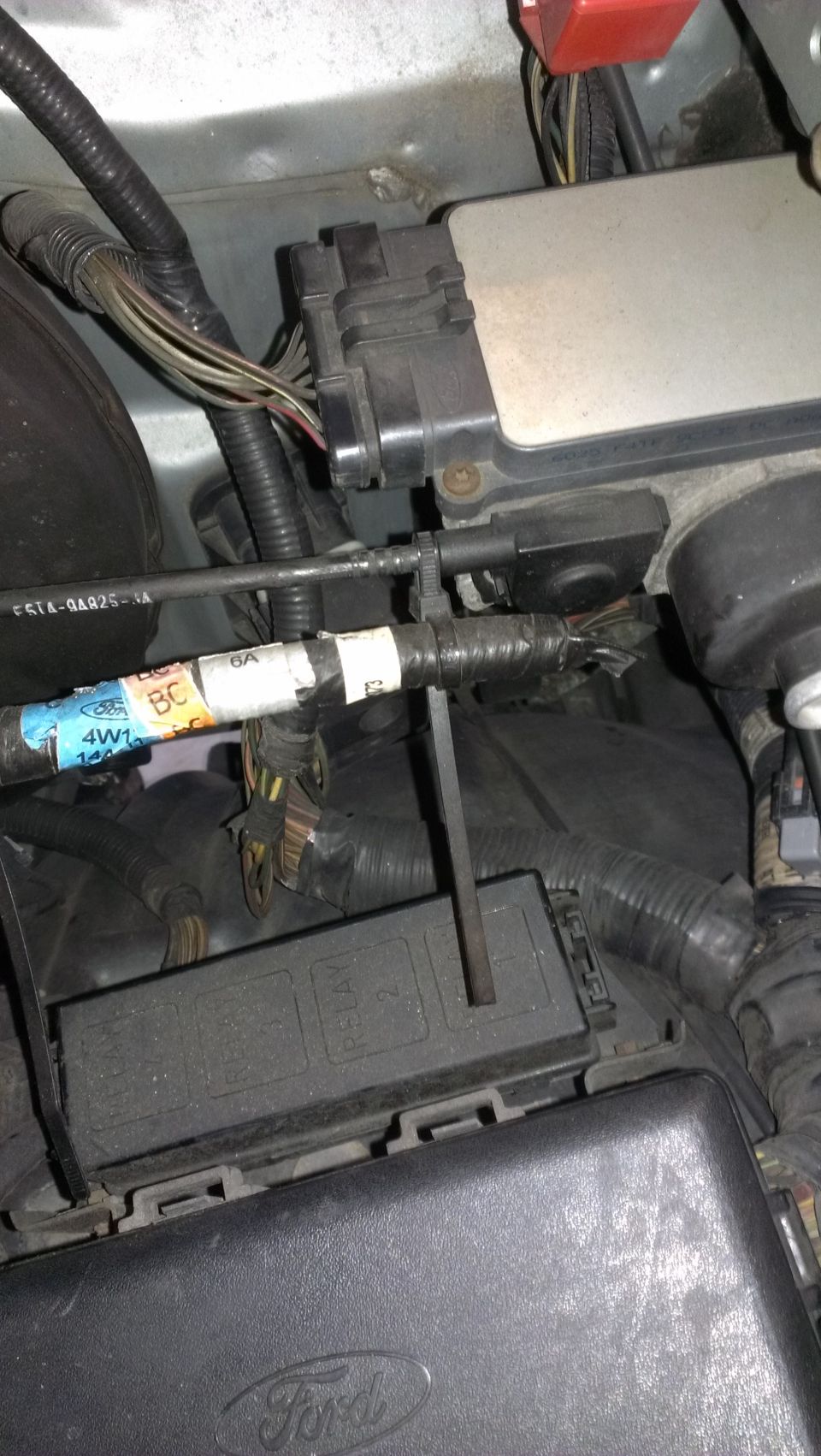Engine bay wiring harness with labels and fuse box