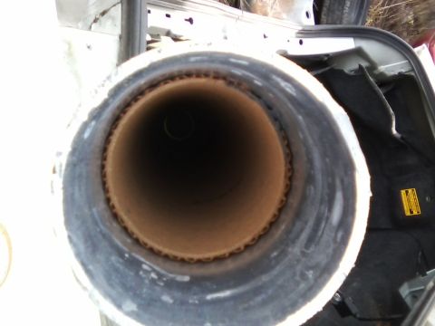 1999 Mercury Grand Marquis - View inside a vehicle's exhaust pipe, with the Supermotors.net logo visible in the lower right corner.
