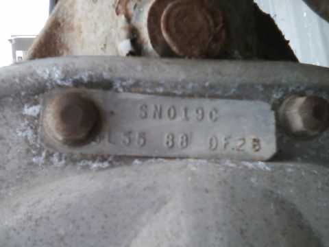 1999 Mercury Grand Marquis - Close-up of an axle part showing stamped identification numbers.