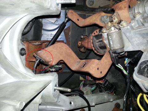 1994 Ford Bronco - Steering column and brake pedal assembly detail with visible wiring and mechanical components.