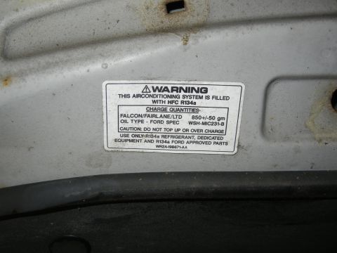 1999 Ford Fairlane - This sticker provides air conditioning charge information for a Ford Falcon/Fairlane/Ltd.