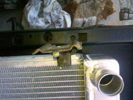 1982 Ford Bronco - Close-up of the radiator and mounting bracket for a 1982 Ford Bronco.