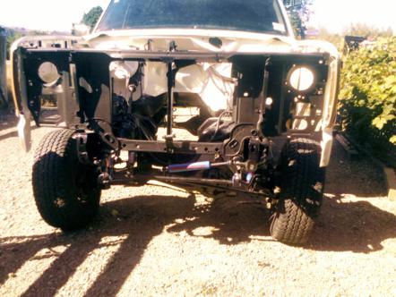 1982 Ford Bronco - Front view of a 1982 Ford Bronco with the engine and front clip removed for work.