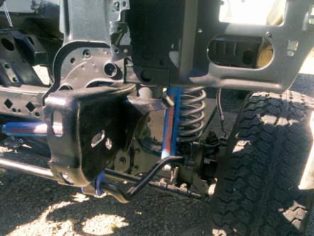 1982 Ford Bronco - This image shows the front suspension and frame of a vehicle, not the engine.