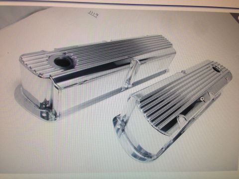 1964 Ford Fairlane - Two polished chrome valve covers are displayed, likely for an engine upgrade or restoration project.